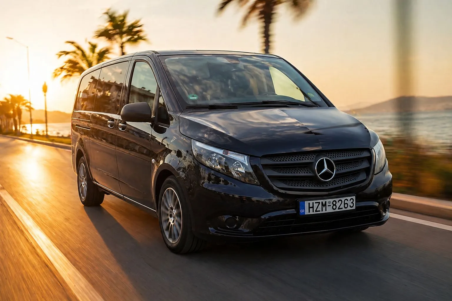 Move Crete Transfer Mercedes van on the Cretan coast at sunset